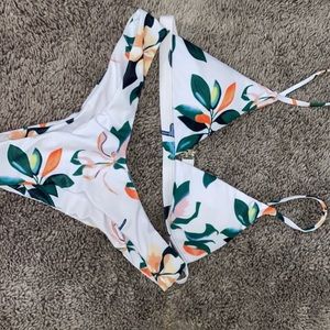 size small thong bathing suit 🤍 never worn